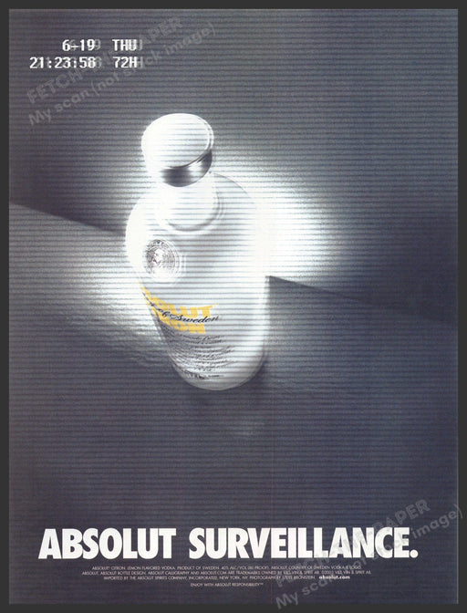 Absolut Surveillance 2000s Print Advertisement 2003 Bottle on Camera Feed Fetch-the-Paper