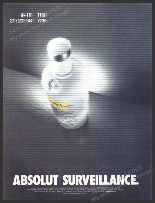 Absolut Surveillance 2000s Print Advertisement 2003 Bottle on Camera Feed Fetch-the-Paper