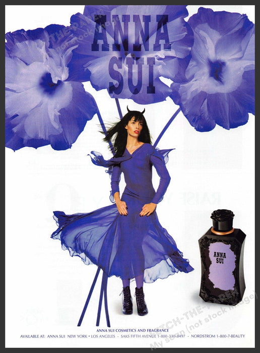 Anna Sui 1990s Print Advertisement 1999 Purple Girl Flower Horns Fetch-the-Paper