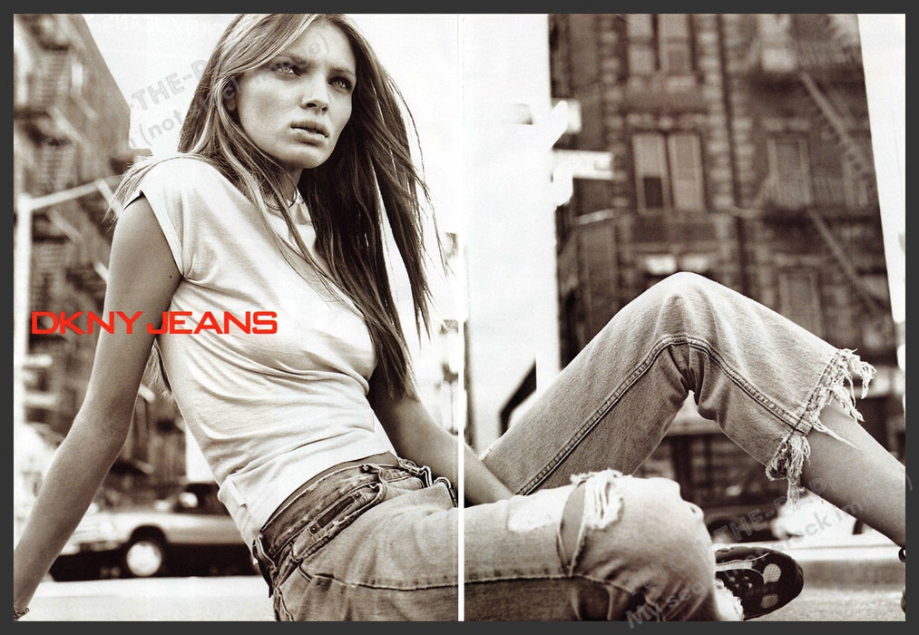 DKNY Jeans Esther Canadas 1990s Print Ad (2 page) 1999 Sitting Cityscape Fetch-the-Paper