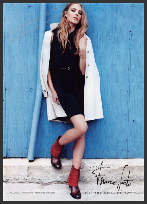 Franco Sarto Shoes 2010s Print Advertisement 2012 Model Posing Against Blue Wall Fetch-the-Paper