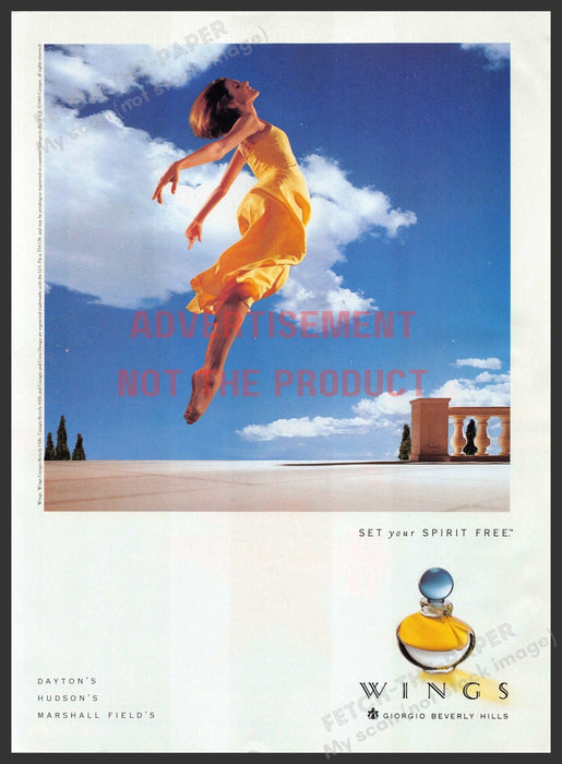 Giorgio Beverly Hills 1990s Print Advertisement 1994 Wings Legs Lady Rising Up Fetch-the-Paper