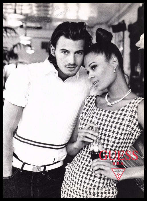 Guess Clothing 1990s Print Advertisement Ad 1996 Couple at the Bar Fetch the Paper!