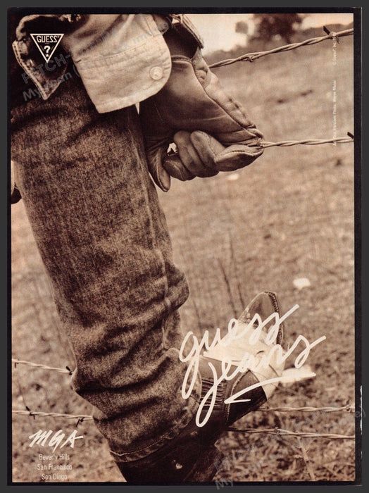 Guess Jeans 1980s Print Advertisement 1986 Cowboy Barbed Wire Fencing Fetch-the-Paper