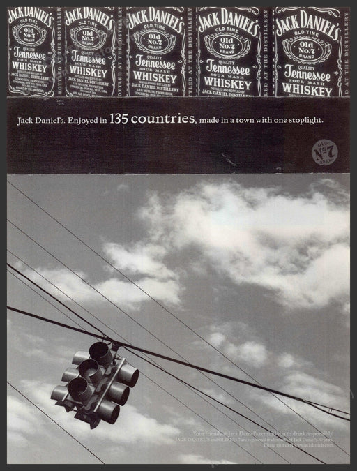 Jack Daniel's Town with one Stoplight 2000s Print Advertisement 2002 Traffic Fetch-the-Paper