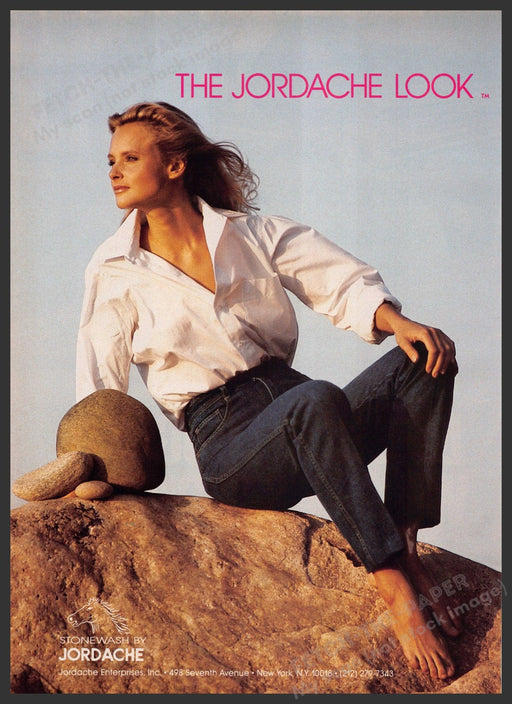 Jordache Stonewash 1980s Print Advertisement 1982 Woman Sitting on Rock Fetch-the-Paper