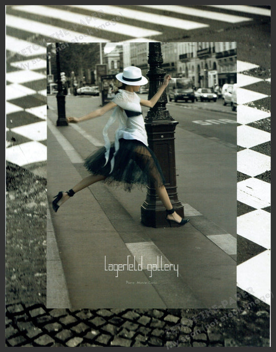 Lagerfeld Gallery 2000s Print Advertisement 2005 Model Running Across the Street Fetch-the-Paper