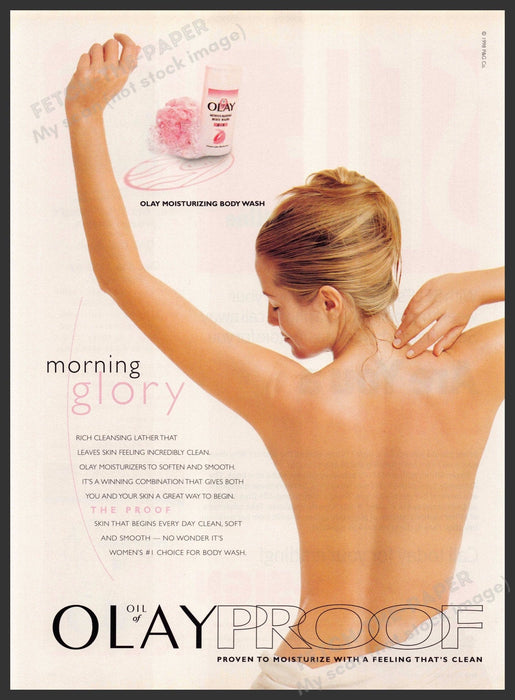 Oil of Olay 1990s Magazine Print Advertisement 1998 Morning Glory Bare Back Fetch-the-Paper