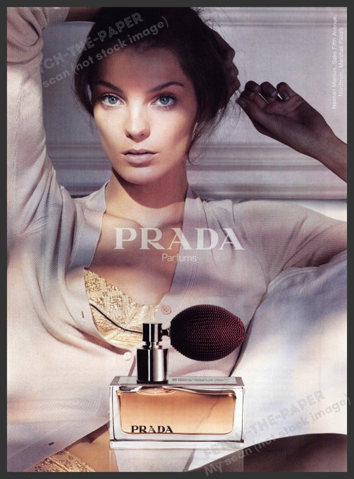 Prada 2000s Print Advertisement 2005 Perfume Model Lounging with Hair Up Prada