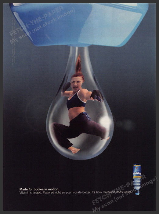 Propel Water 2000s Print Advertisement 2004 Drop Girl Fighting Bodies in Motion Fetch-the-Paper