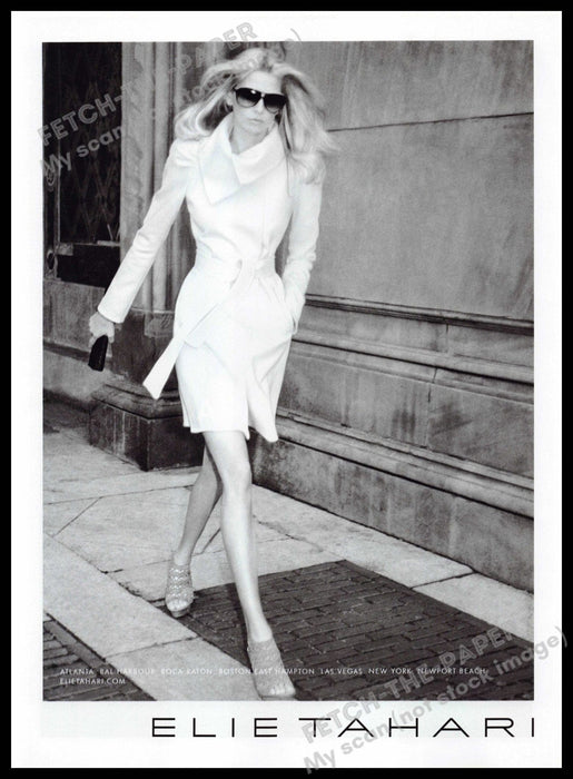White House Black Market 2010s Print Advertisement 2010 Legs Sidewalk Working Fetch-the-Paper