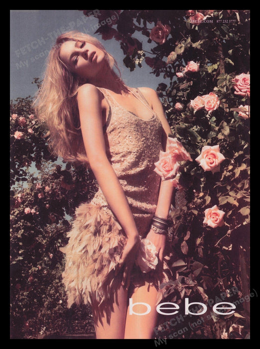 bebe 2000s Print Advertisement Ad 2009 Sexy Girl in Rose Bushes Clothing Fetch the Paper!