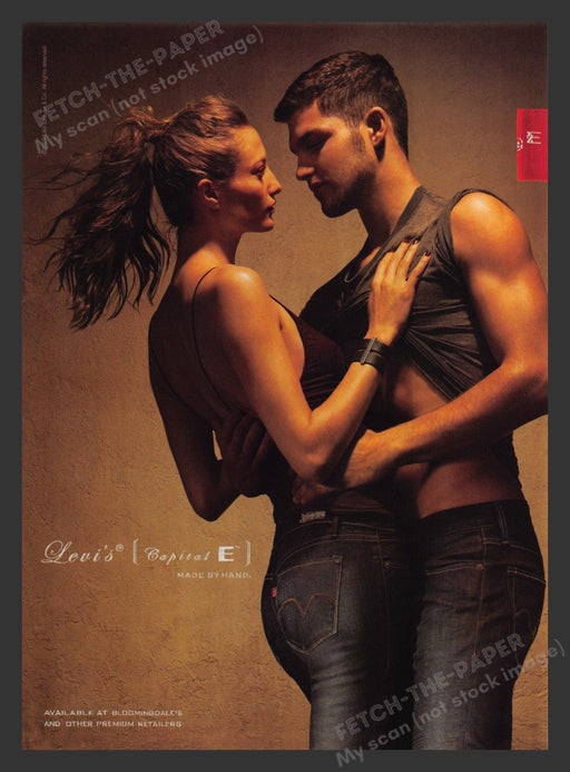 Levi's 2000s Print Advertisement 2007 Capital E Jeans Sexy Couple Fetch the Paper!