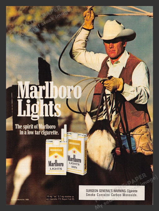 1986 Marlboro Lights Cigarettes Roping Cowboy Corral Print Advertisement Ad