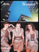 Alma Clothing 1980s Print Advertisement Ad 1982 Cityscape Night Models Fetch the Paper!