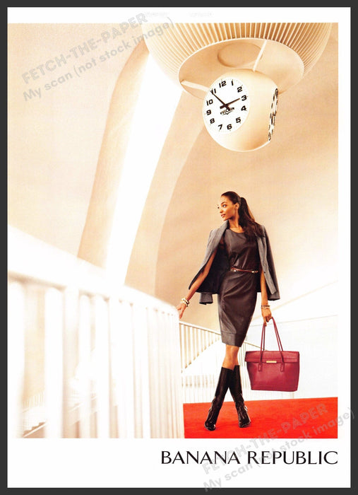 Banana Republic 2010s Print Advertisement 2012 Working Woman Legs Briefcase Fetch-the-Paper