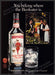 Beefeater Gin 1980s Print Advertisement 1982 "You belong where the Beefeater is" Fetch-the-Paper