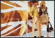 Burberry 2000s Print Advertisement (2 page) 2006 Couple Legs Mustard Yellow Burberry