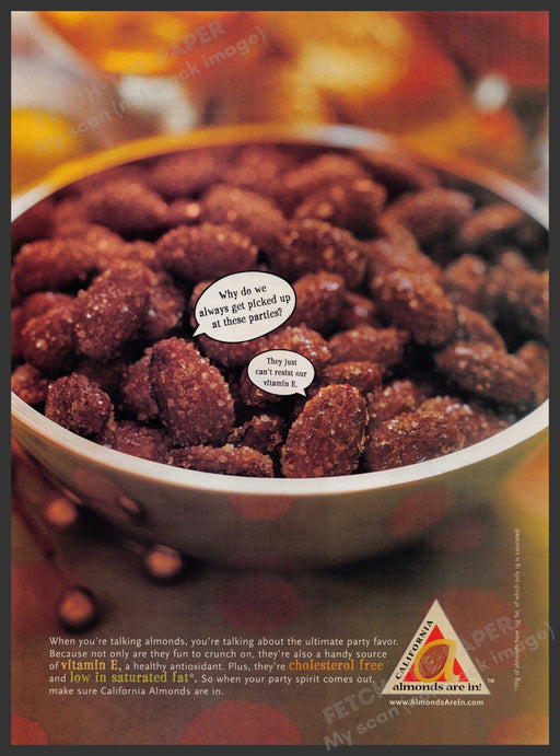 California Almonds 2000s Print Advertisement 2001 Vitamin E Irresistible Fetch-the-Paper