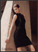 Calvin Klein Clothing 2010s Print Advertisement 2010 Pillar Little Black Dress Fetch-the-Paper