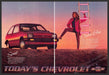 Chevrolet Sprint 1980s Print Advertisement (2 page) 1986 Woman Corporate Ladder Fetch-the-Paper