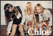 Chloe Clothing 2000s Print Advertisement (2 page centerfold) 2007 Couch Legs Fetch-the-Paper