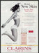 Clarins Paris Body Serum 2000s Print Advertisement Ad 2000 Jumping Fetch-the-Paper