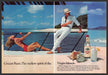 Cruzan Rum 1980s Print Advertisement (2 page) 1982 Couple on the Beach Fetch-the-Paper