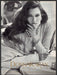 Donna Karan New York Rosemary McGratha 1980s Print Advertisement Ad 1987 Fetch-the-Paper