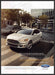 Ford Fusion Hybrid 2000s Print Advertisement 2013 Downtown Fetch-the-Paper