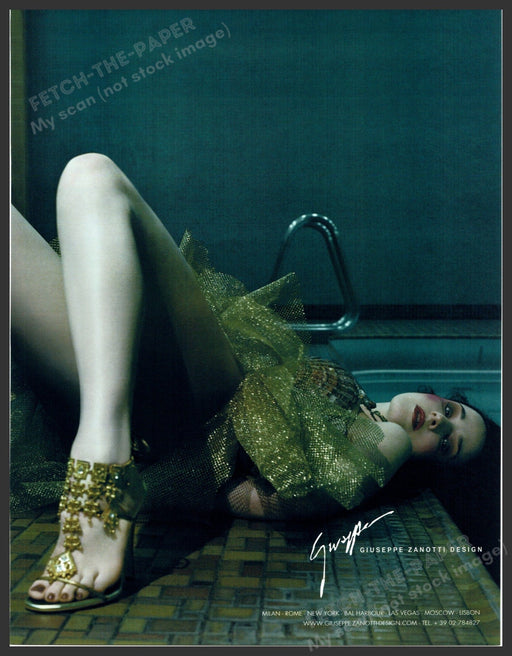 Giuseppe Zanotti 2000s Print Advertisement 2005 Indoor Pool Tile Floor Laying Fetch-the-Paper