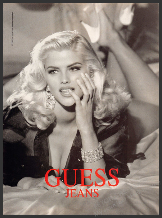 Guess 1990s Print Advertisement 1993 Anna Nicole Smith Finger Mouth Bed Guess