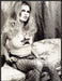 Guess 2000s Print Advertisement 2003 Fish Net Stockings Legs Fetch-the-Paper