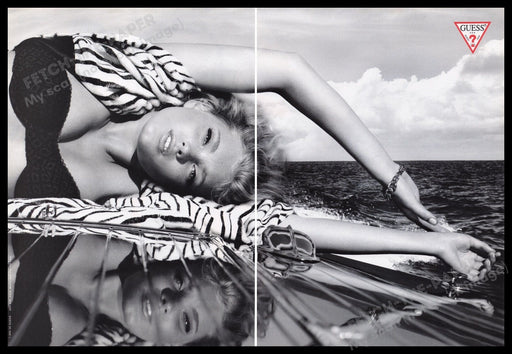 Guess Clothing Wooden Boat Elsa Hosk 2000s Print Advertisement (2 pages) 2007 Fetch-the-Paper