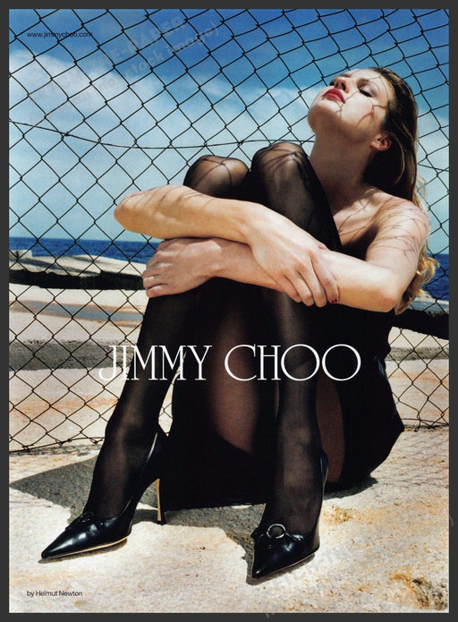 Jimmy Choo 2000s Print Advertisement 2002 Legs Sitting Sand by Fence Fetch-the-Paper