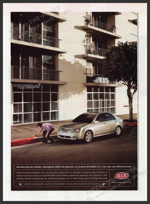 Kia Spectra Car 2000s Print Advertisement 2004 Painting Curb Red Fetch-the-Paper