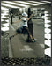 Lagerfeld Gallery 2000s Print Advertisement 2005 Model Running Across the Street Fetch-the-Paper
