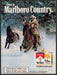 Marlboro 1980s Print Advertisement 1986 Deep Snow Herd Cowboy Roping Marlboro