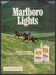 Marlboro Lights 1980s Print Advertisement 1981 Cowboy Chasing Horse Fetch-the-Paper