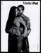Meltin' Pot Clothing 2000s Print Advertisement 2005 Embracing Couple Fetch-the-Paper