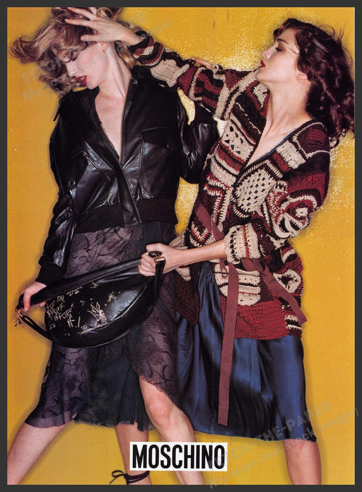 Moschino 2000s Print Advertisement 2002 Fashion Girls Fighting Over Handbag Fetch-the-Paper