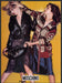Moschino 2000s Print Advertisement 2002 Fashion Girls Fighting Over Handbag Fetch-the-Paper
