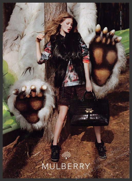 Mulberry 2010s Print Advertisement 2012 Where the Wild Things Are Monster Feet Fetch-the-Paper