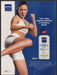 Nivea Q10 2000s Print Advertisement 2003 Lotion Body Kickboxing Woman Fetch-the-Paper