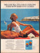 Nivea Sun Tan 1980s Print Advertisement 1986 Europe Couple Ocean Water Legs Fetch-the-Paper