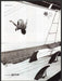 OP Ocean Pacific 2000s Print Advertisement 2003 Pier Surf Board Jumping Fetch-the-Paper