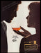 Remy Martin Cognac 1980s Print Ad 1984 Share the Sense of Remy Fetch-the-Paper