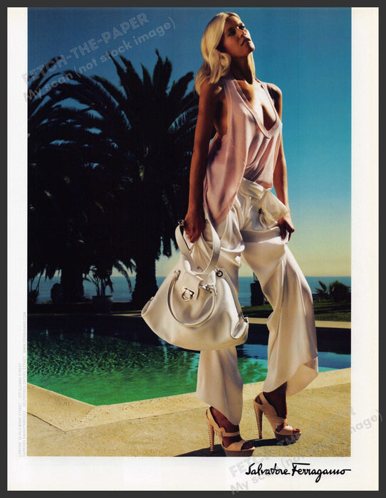 Salvatore Ferragamo Claudia Schiffer 2000s Print Advertisement Ad 2009 Poolside Fetch-the-Paper
