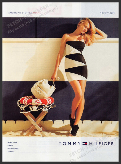 Tommy Hilfiger Fashion 2010s Print Advertisement Ad 2010 Legs Beach Building Fetch-the-Paper