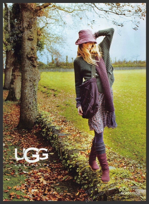 UGG Australia 2000s Print Advertisement 2009 Model Walking on Rock Wall Ugg